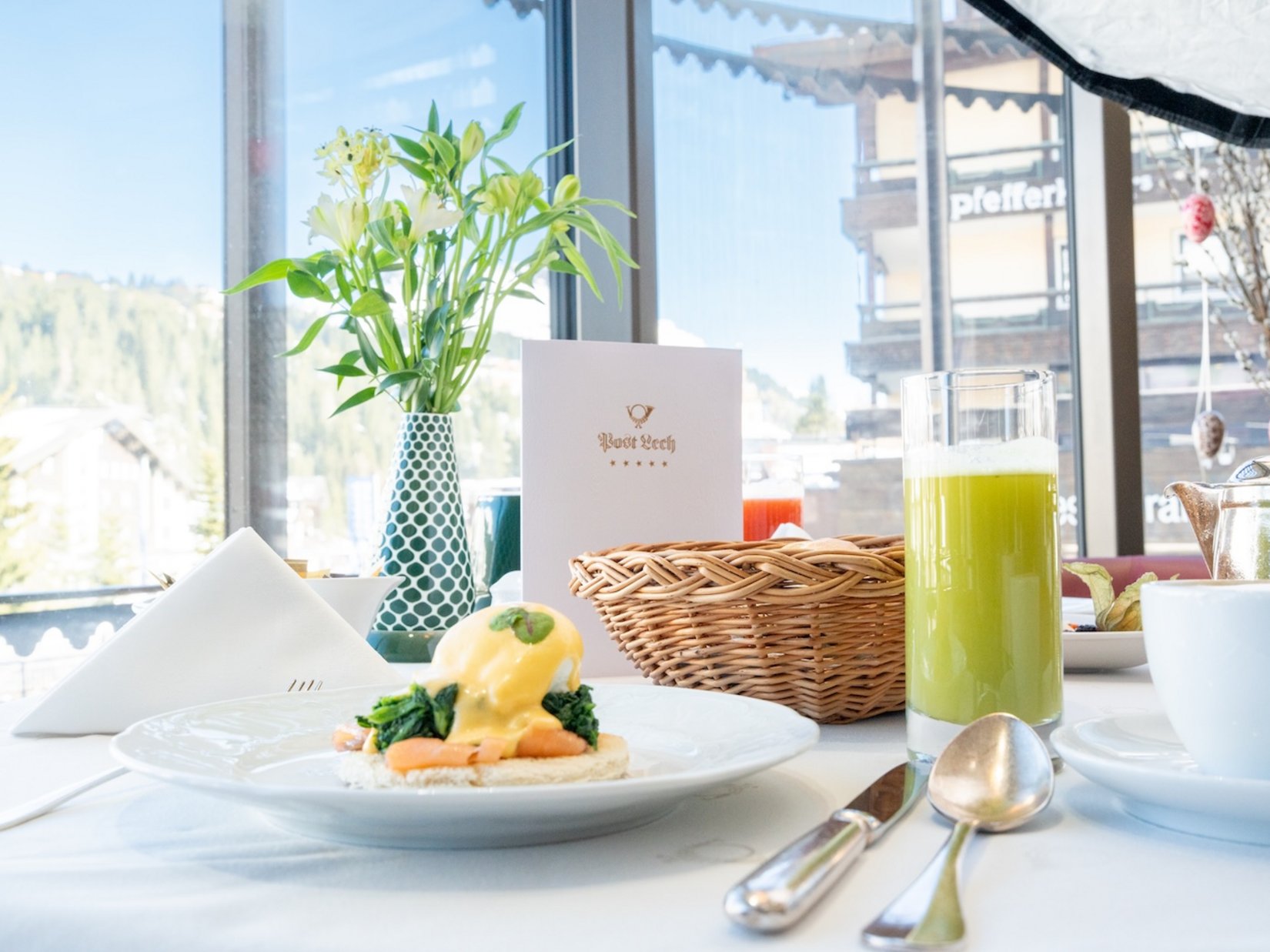 Impressions Elegant breakfast by the window with mountain view and fresh flowers
